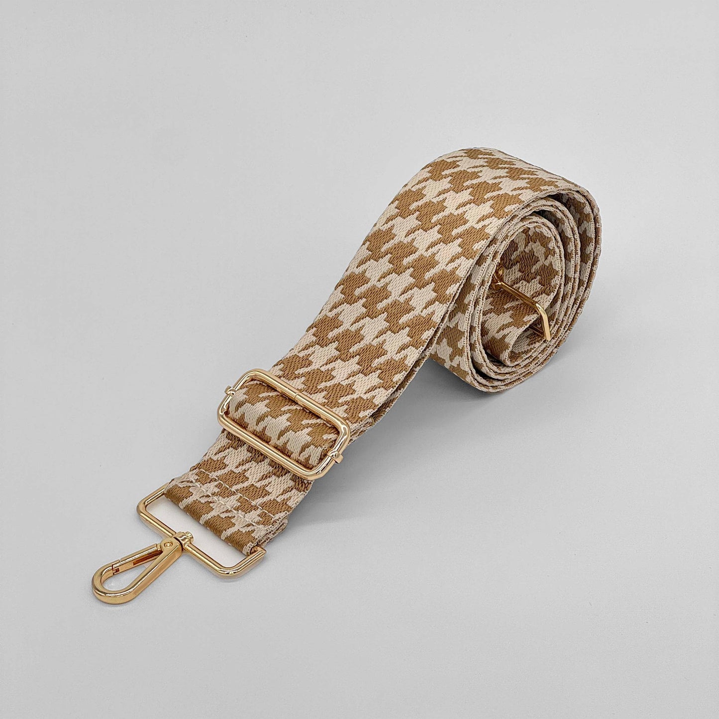 Taschenriemen aus mittelgoldenem Hahnentrittmuster