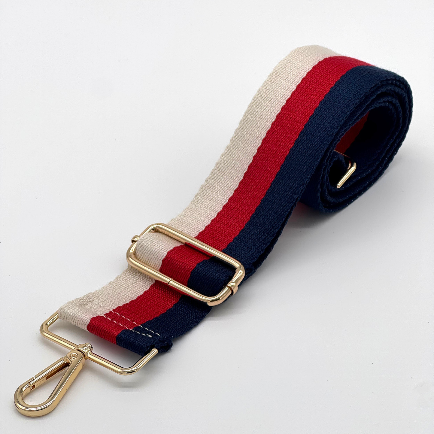 Taschenriemen mit roten, weißen und blauen Streifen
