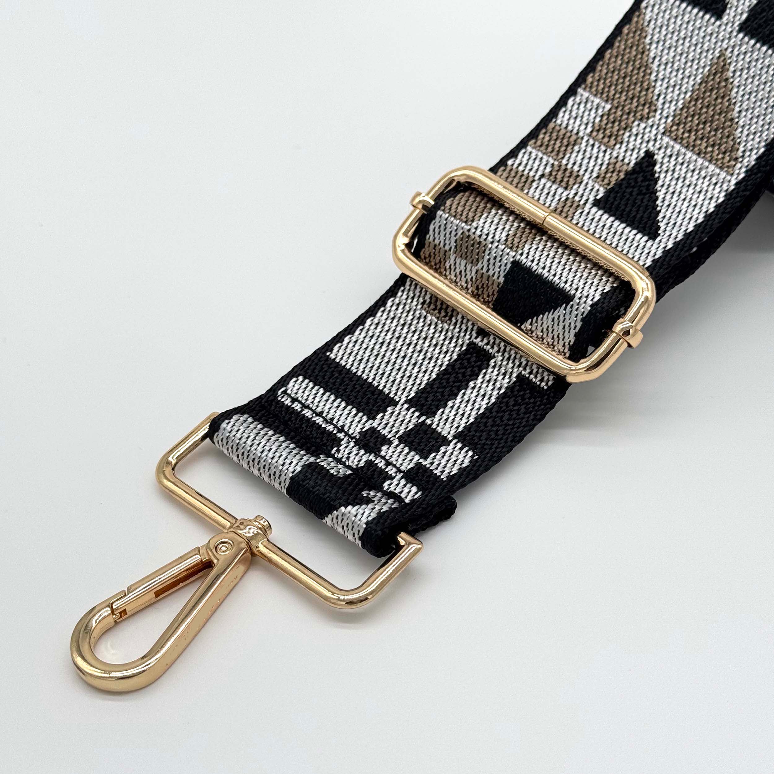 Schwarzer abstrakter Taschenriemen