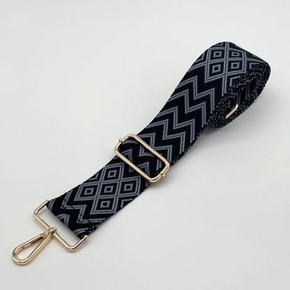 Schwarzer und blauer Zickzack-Taschenriemen