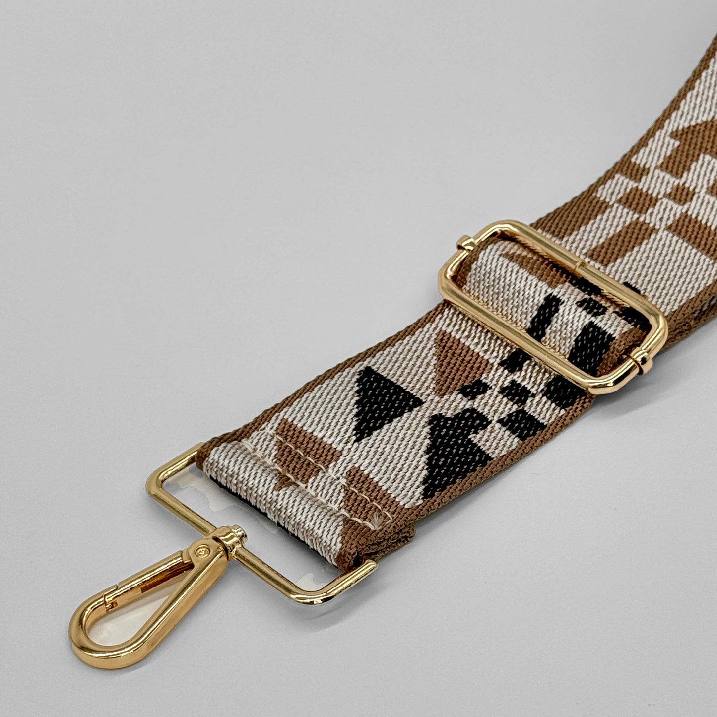 Brauner abstrakter Taschenriemen