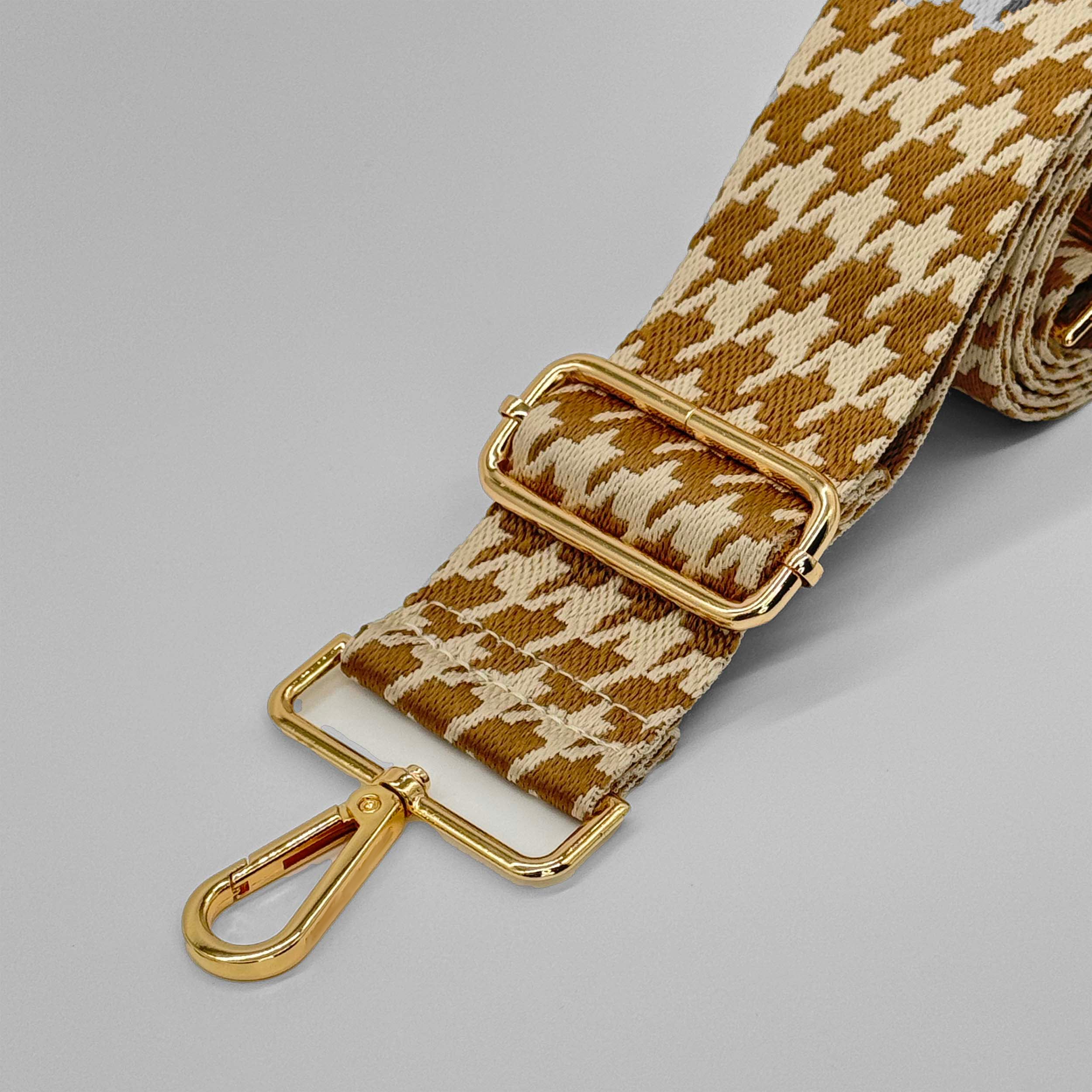 Taschenriemen aus mittelgoldenem Hahnentrittmuster