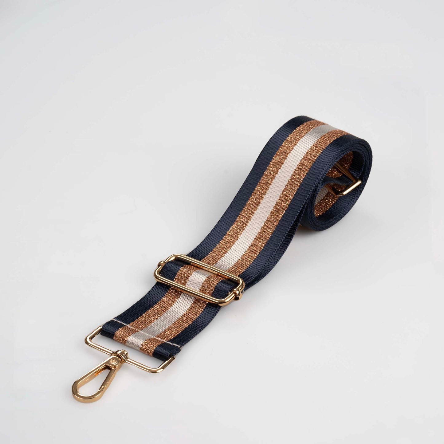 Taschenriemen mit marineblauen und goldenen Metallic-Streifen