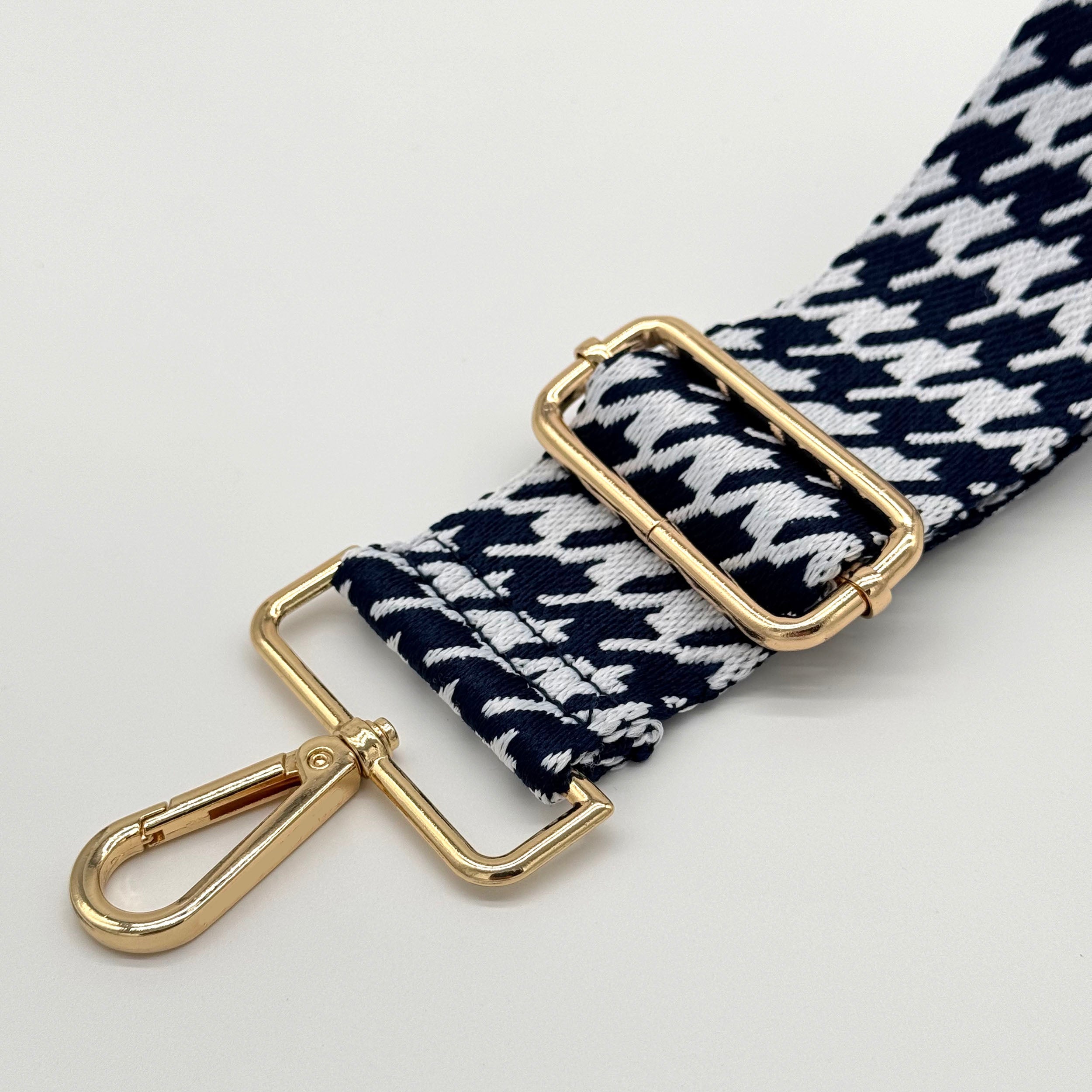Taschenriemen aus marineblauem Hahnentrittmuster