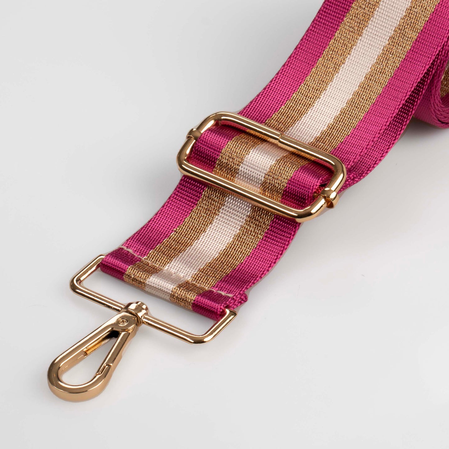 Taschenriemen mit rosa-goldenen Metallic-Streifen