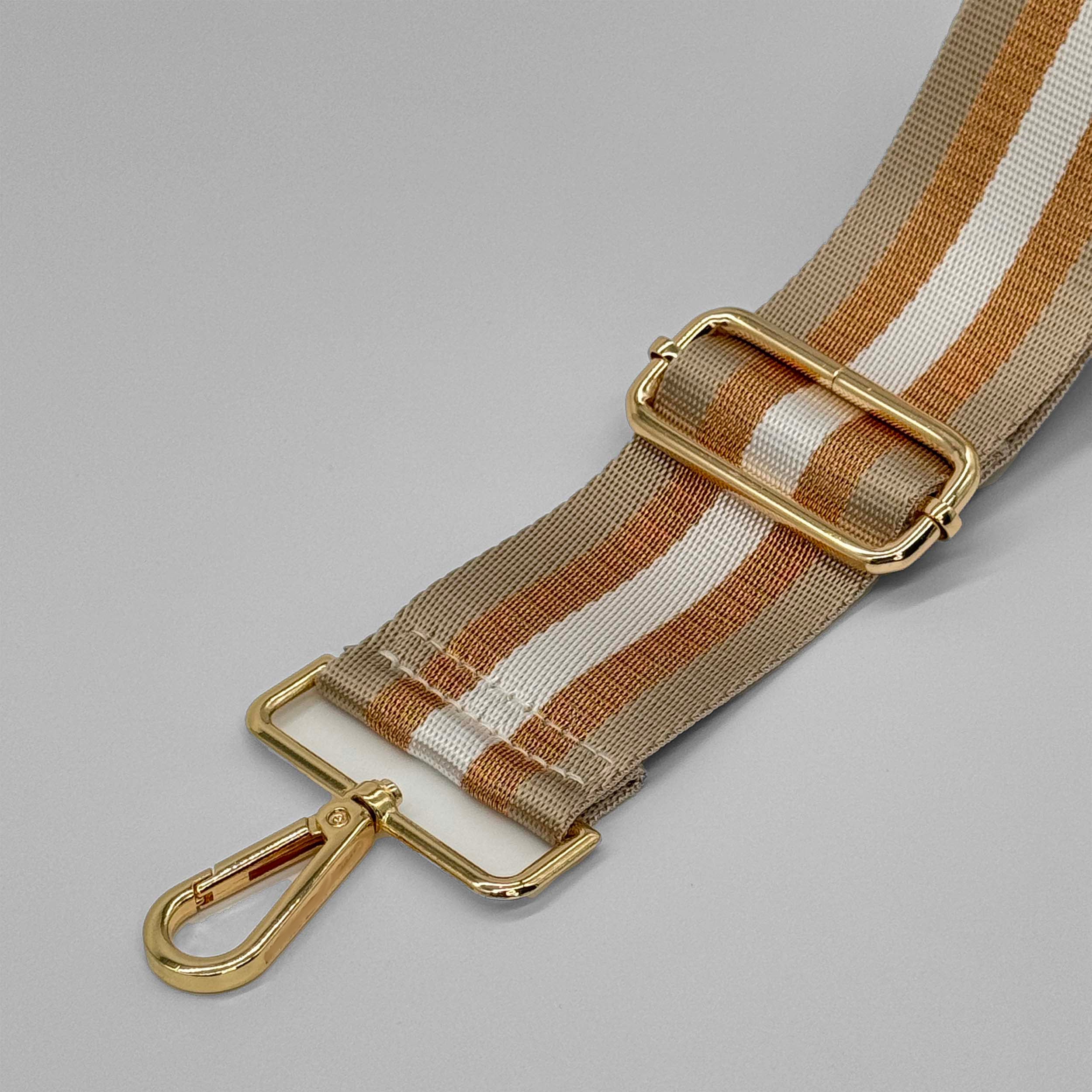 Taschenriemen mit steinfarbenen und goldfarbenen Metallic-Streifen