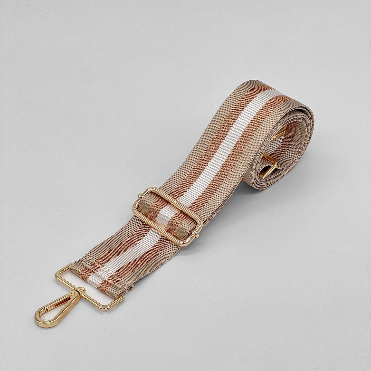 Taschenriemen mit steinfarbenen und goldfarbenen Metallic-Streifen